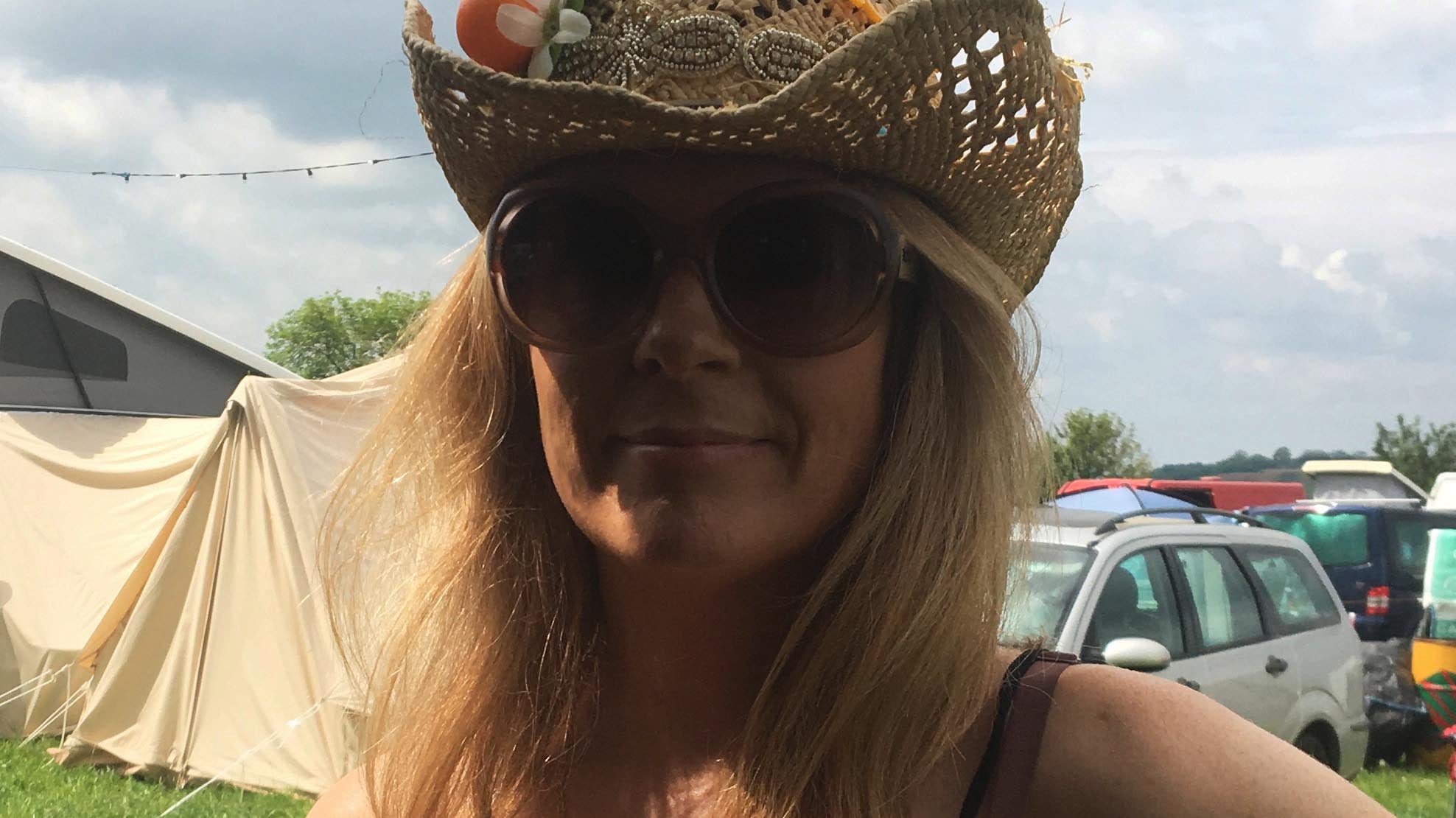 Sarah Day, Founder of Wear and Resist wears a Persist necklace.