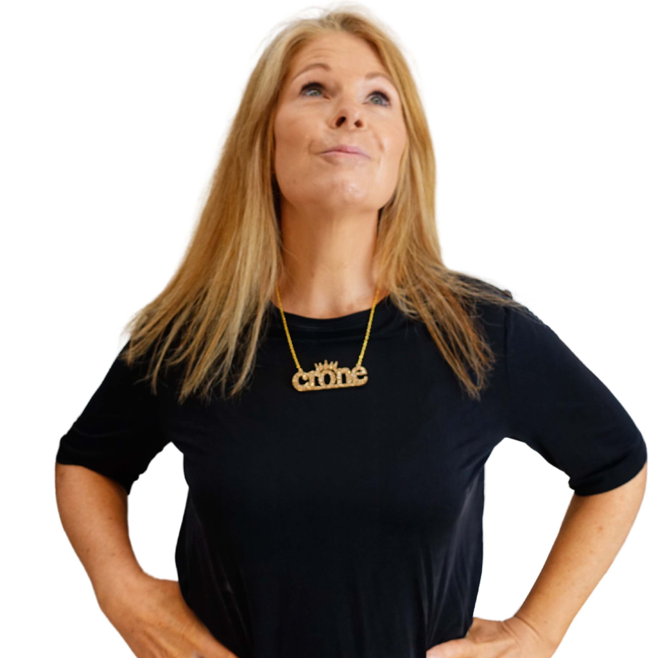 Sarah Day wears a Crone necklace in gold glitter.