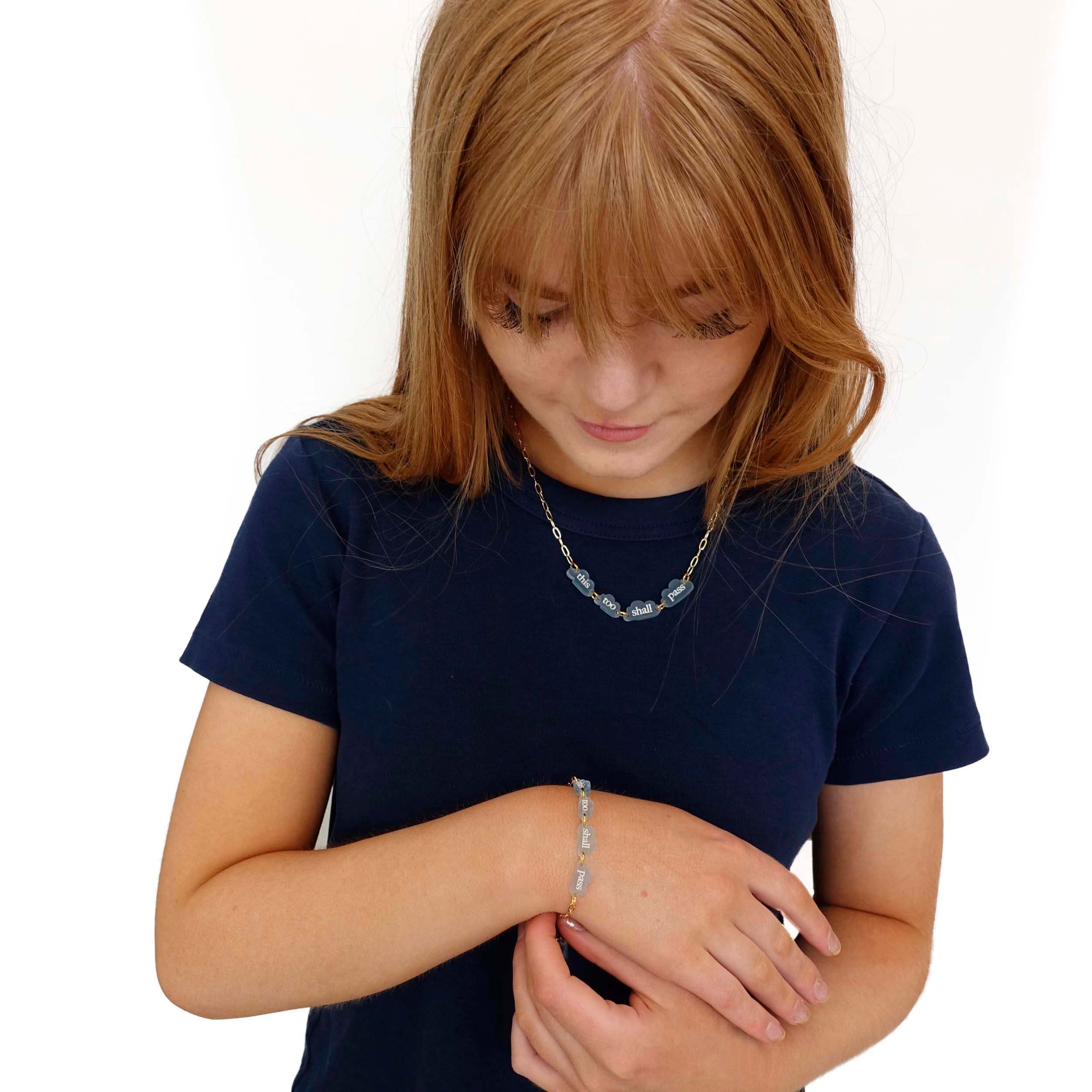 Eliza wears new This too shall pass necklace and bracelet