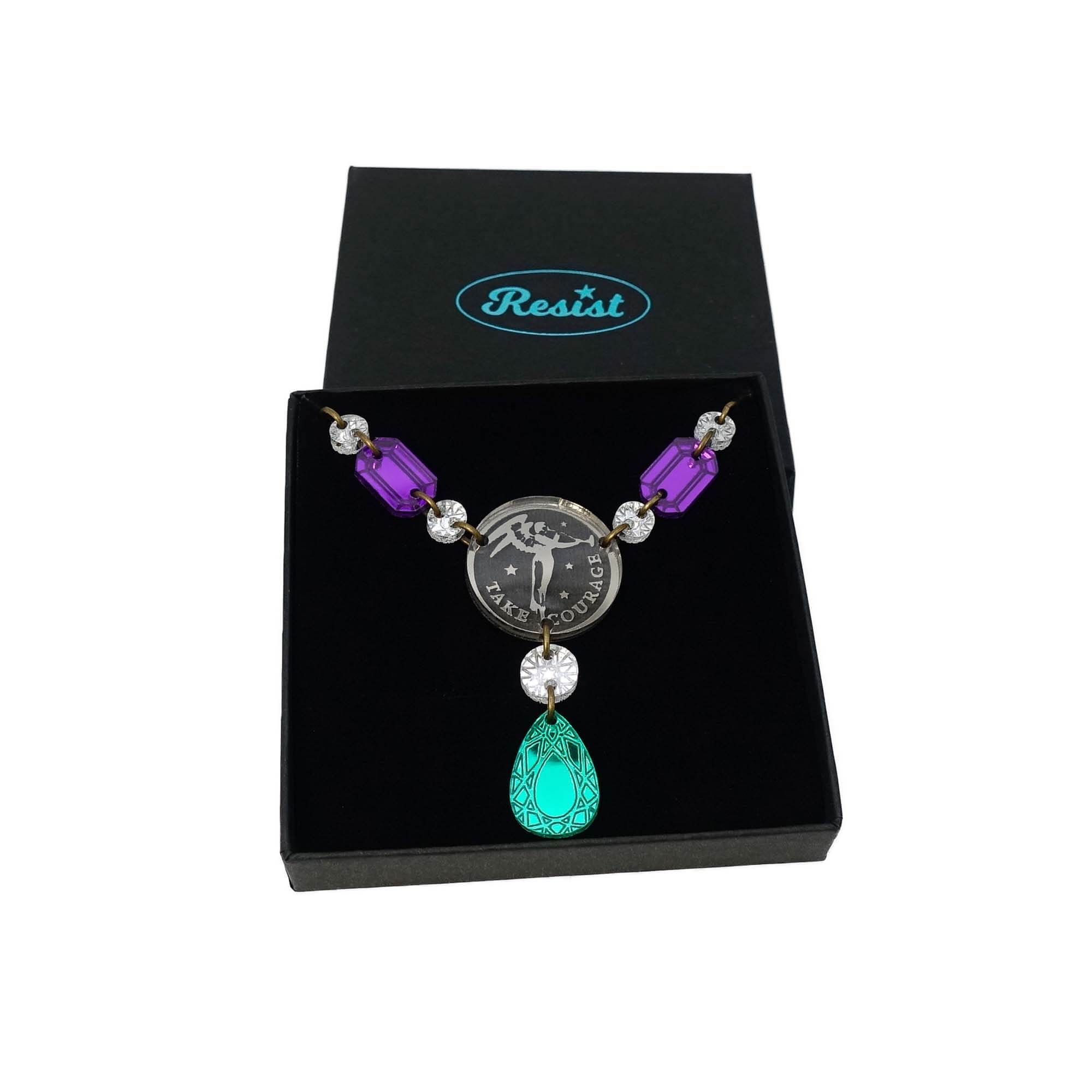 The Angel of Freedom necklace shown in a Wear and Resist gift box.