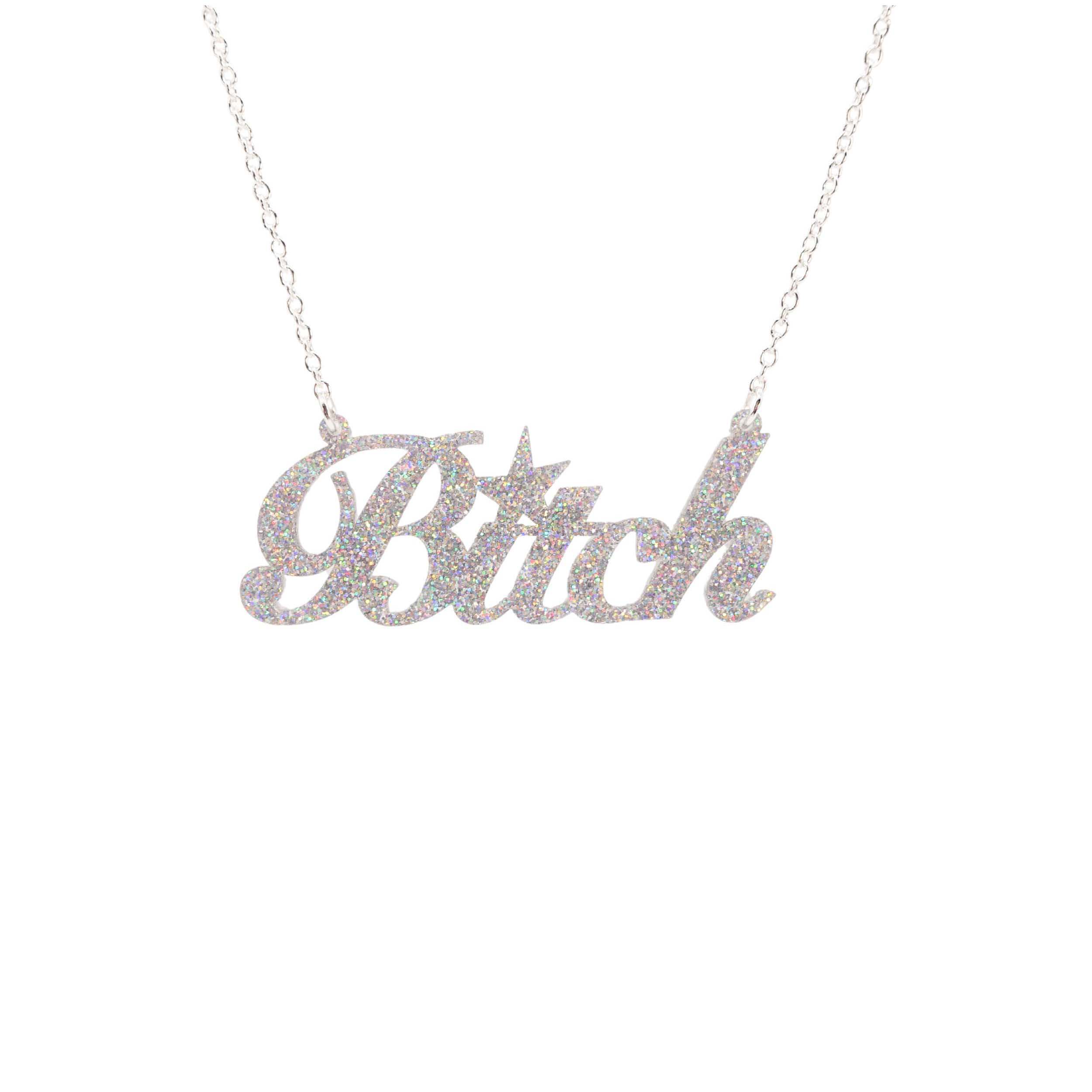B*tch necklace in silver glitter shown hanging against a white background. £2 goes to Bloody Good Period.