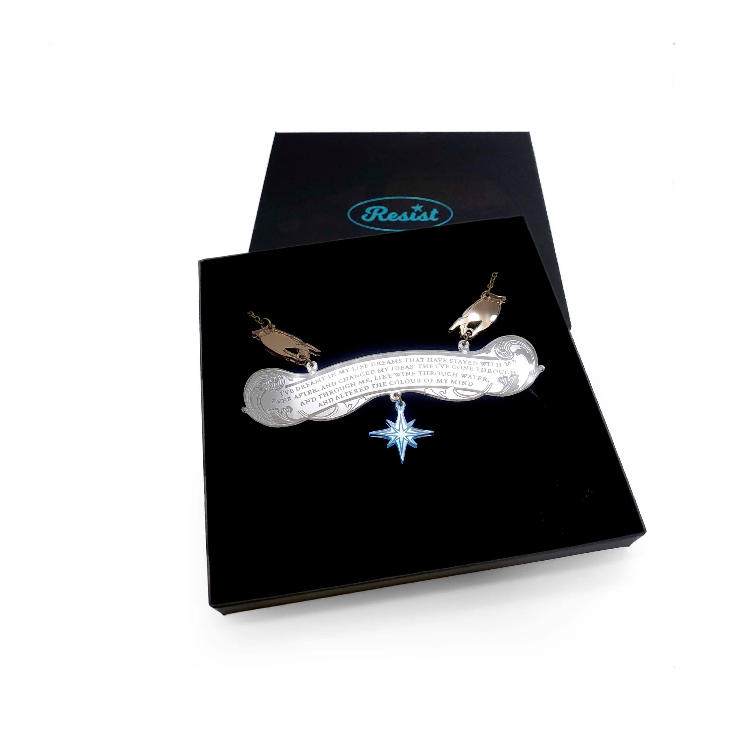 The Wuthering Heights Dreams necklace shown in a large Wear and Resist gift box.