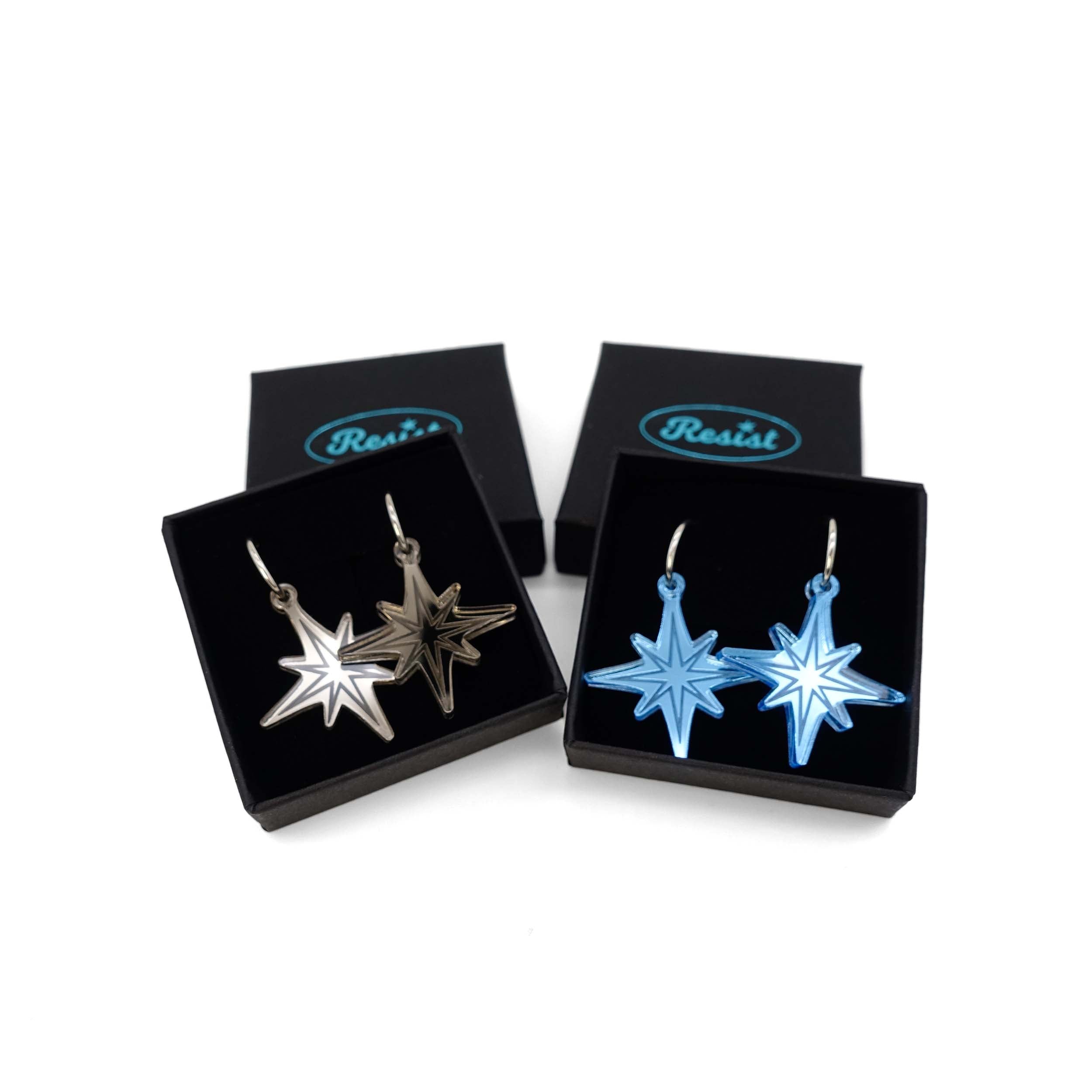 Etched Vintage Star earrings in blue and bronze mirror, part of the Bronte Collection, designed by Sarah Day for Wear and Resist in collaboration with the Bronte Parsonage Museum.