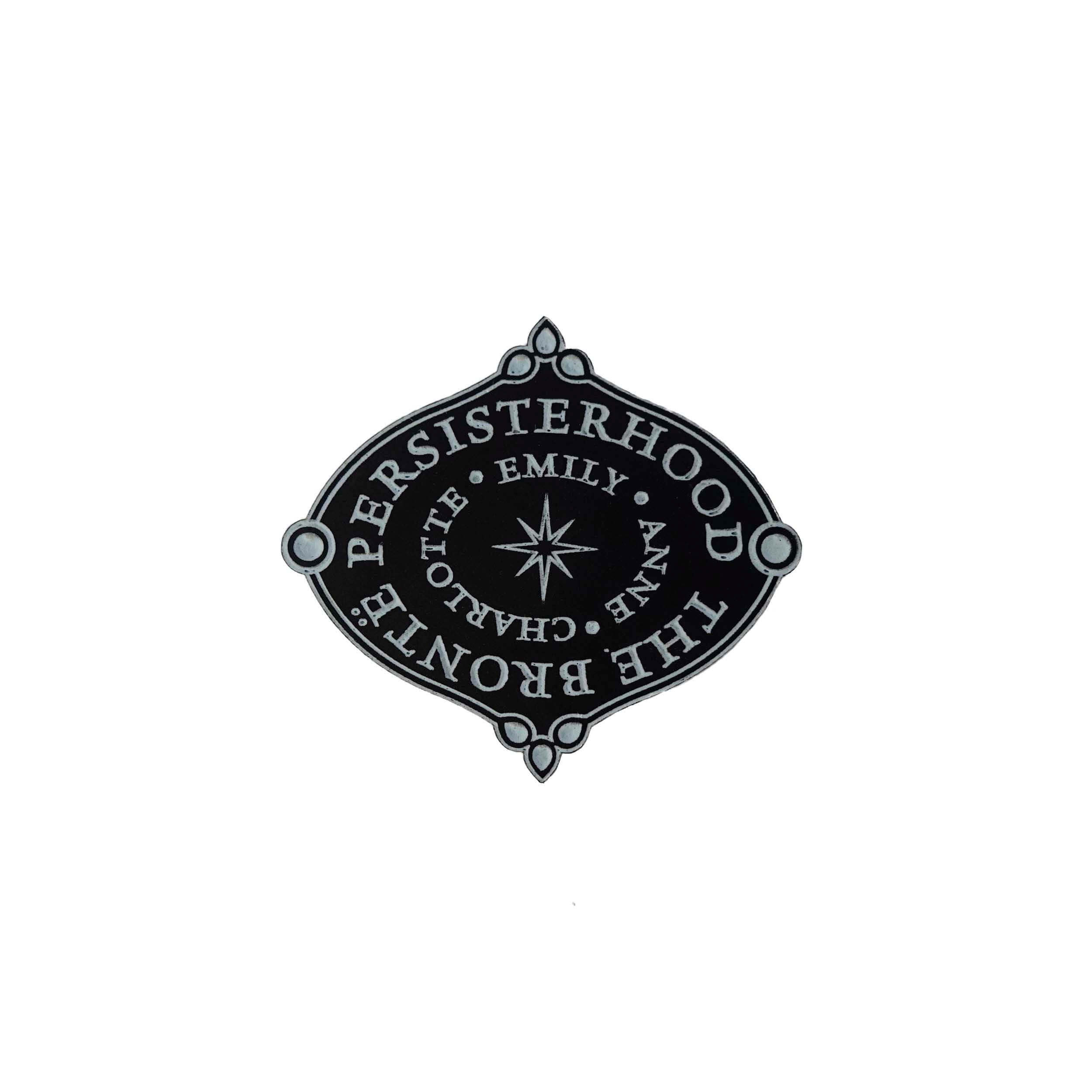 The Brontë Persisterhood brooch: Charlotte, Emily Anne, one of the greatest Persisterhoods in literature. The words are etched in glow-in-the-dark pigment.