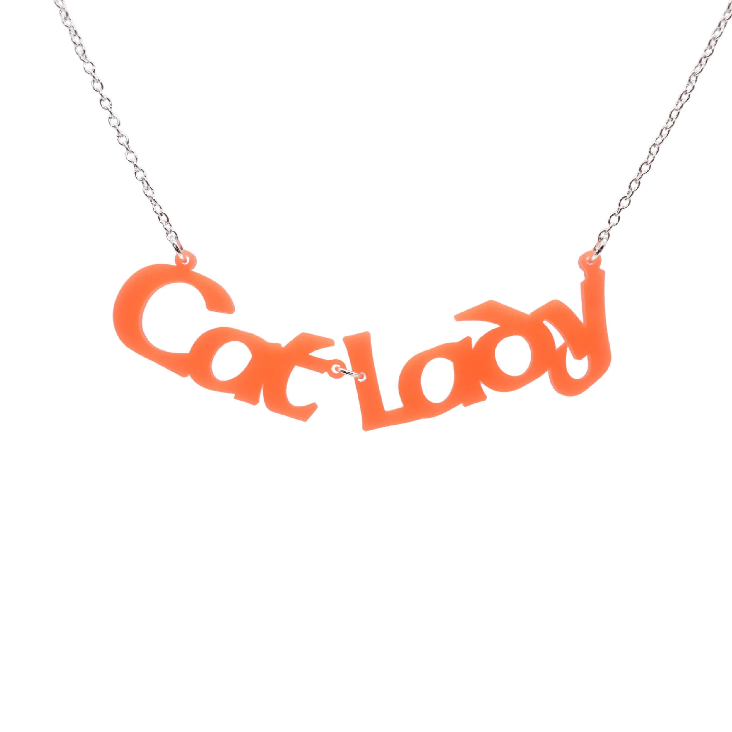 Cat Lady necklace in orange, shown hanging against a white background.