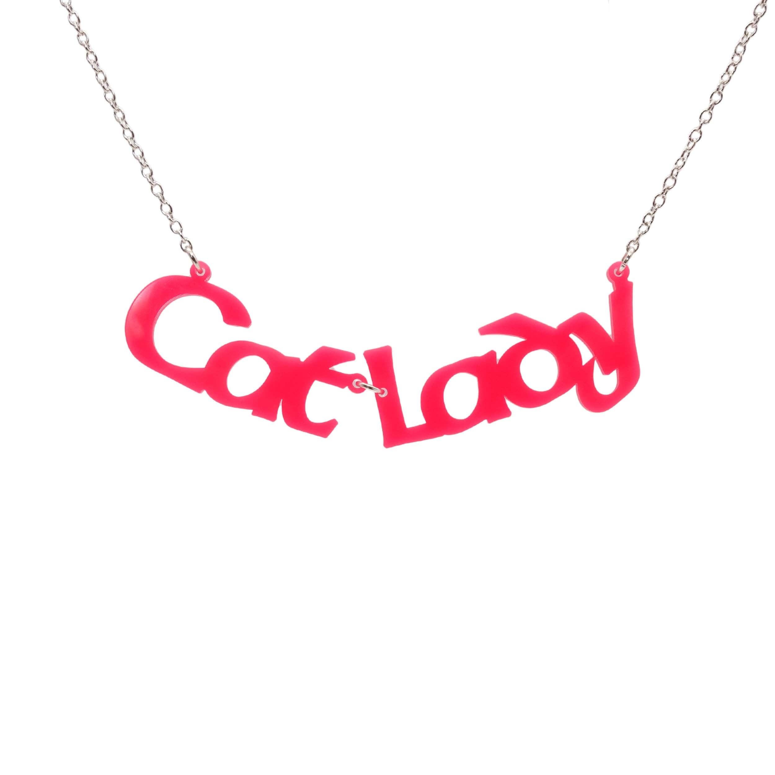 Cat Lady necklace in hot pink, shown hanging against a white background. For all proud cat ladies everywhere!