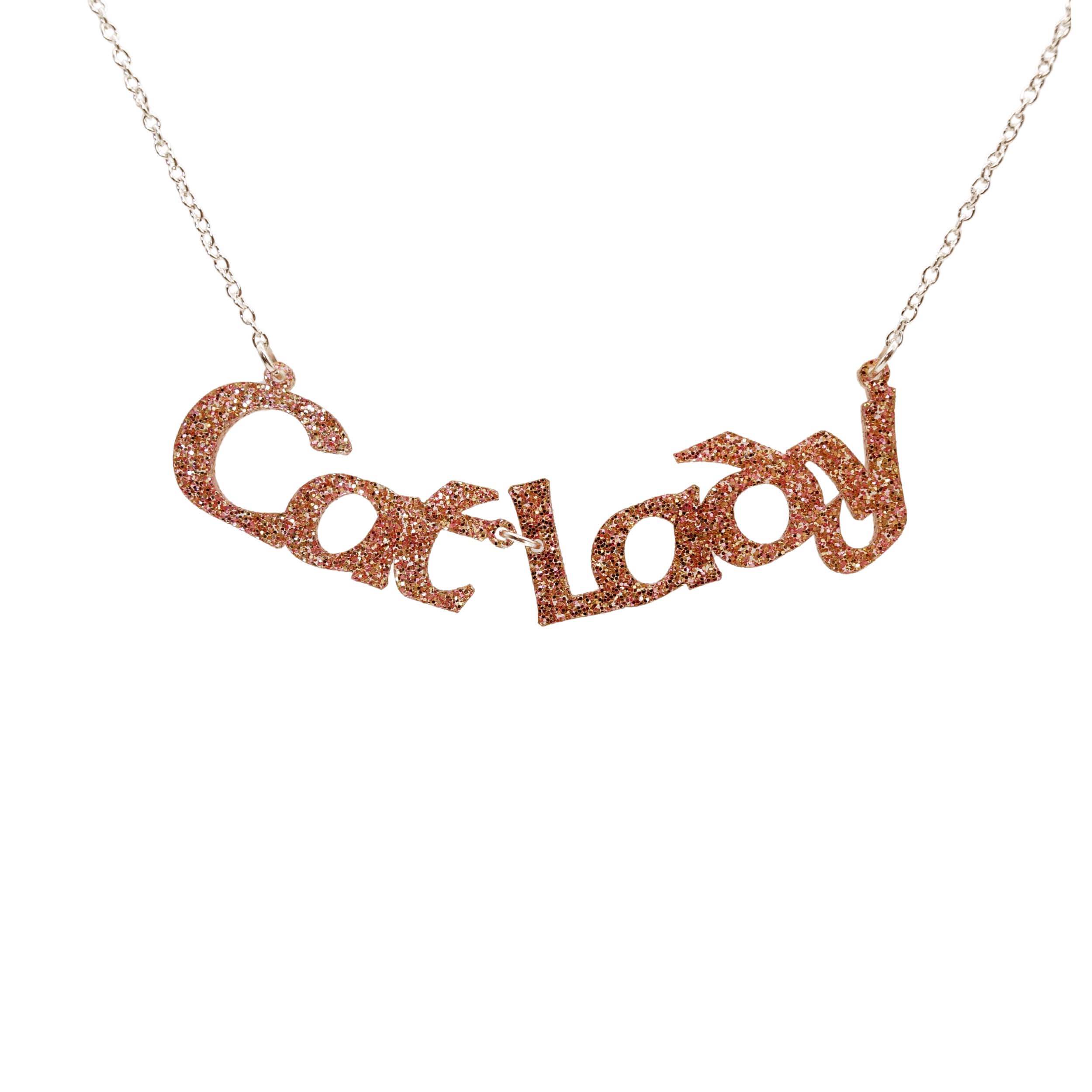 Cat Lady necklace in pink fizz glitter, shown hanging against a white background.