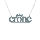 Crone necklace in duck egg green, shown hanging against a white background.