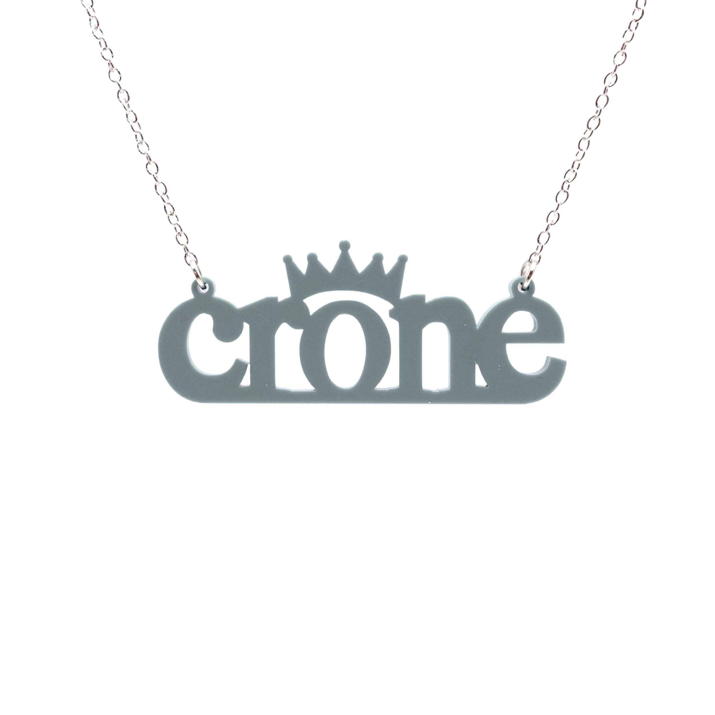 Crone necklace in duck egg green, shown hanging against a white background.