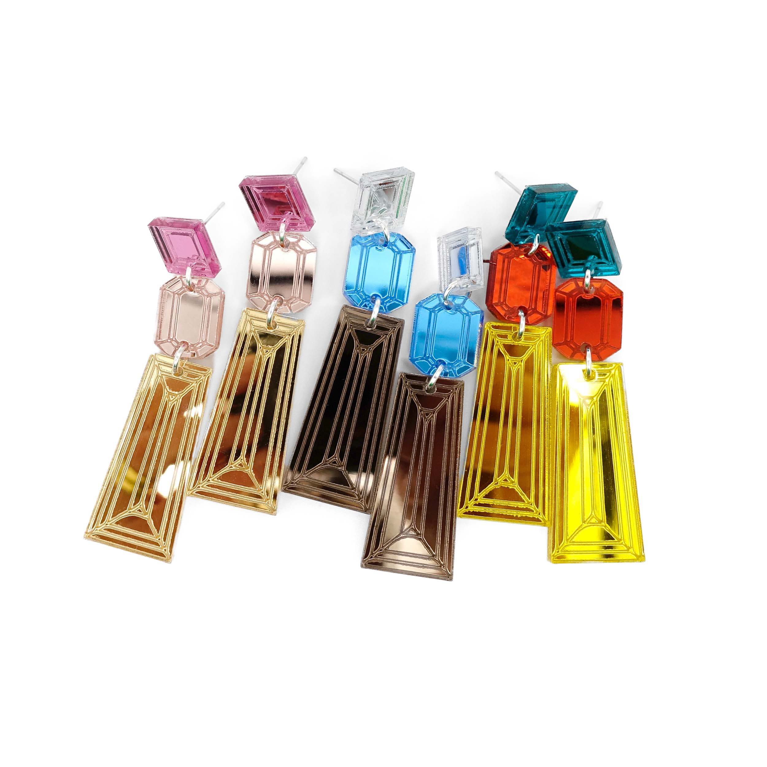A group shot of three pairs of Deco Drop long earrings.