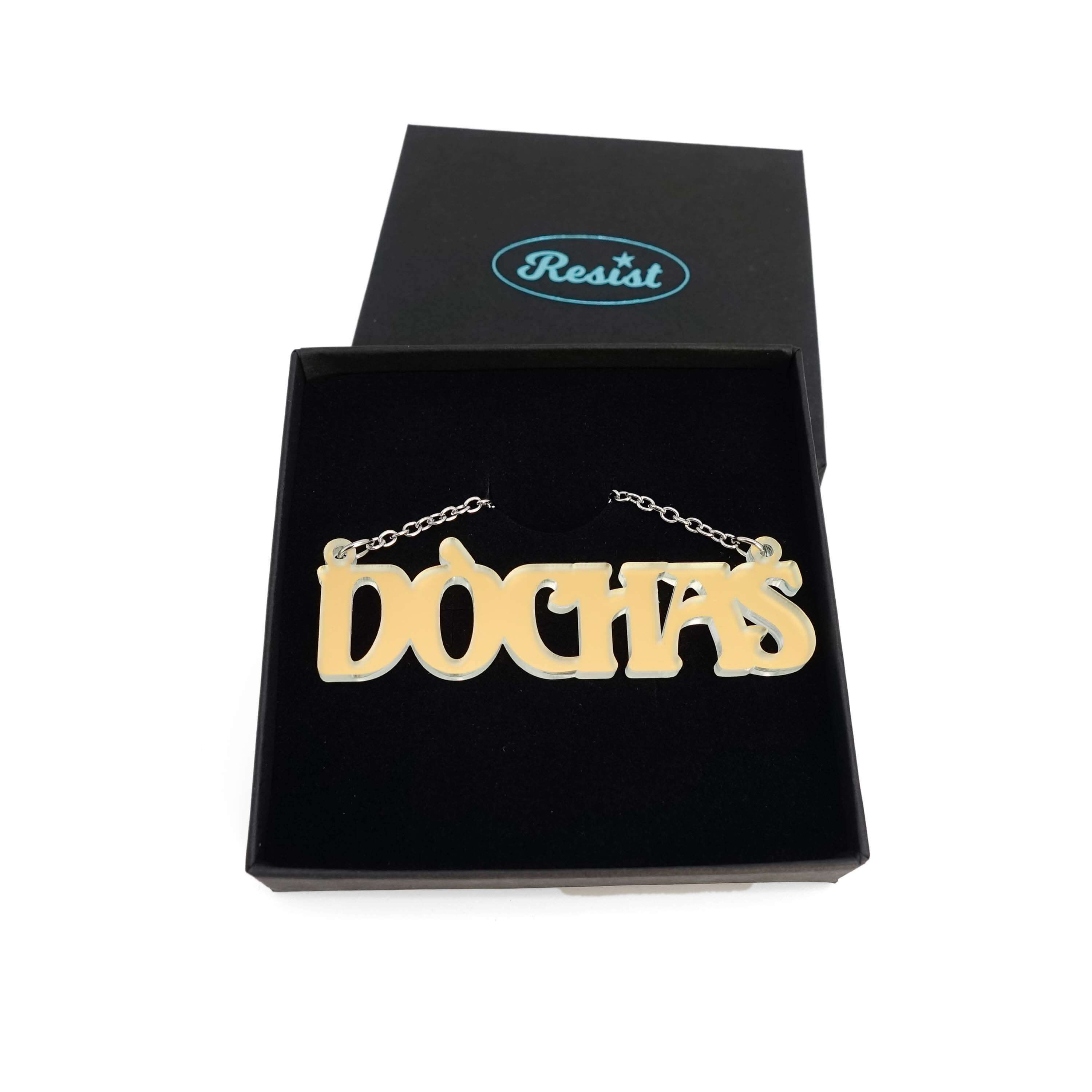 DÒCHAS Irish Gaelige hope necklace in matte iridescent, shown in a Wear & Resist gift box.