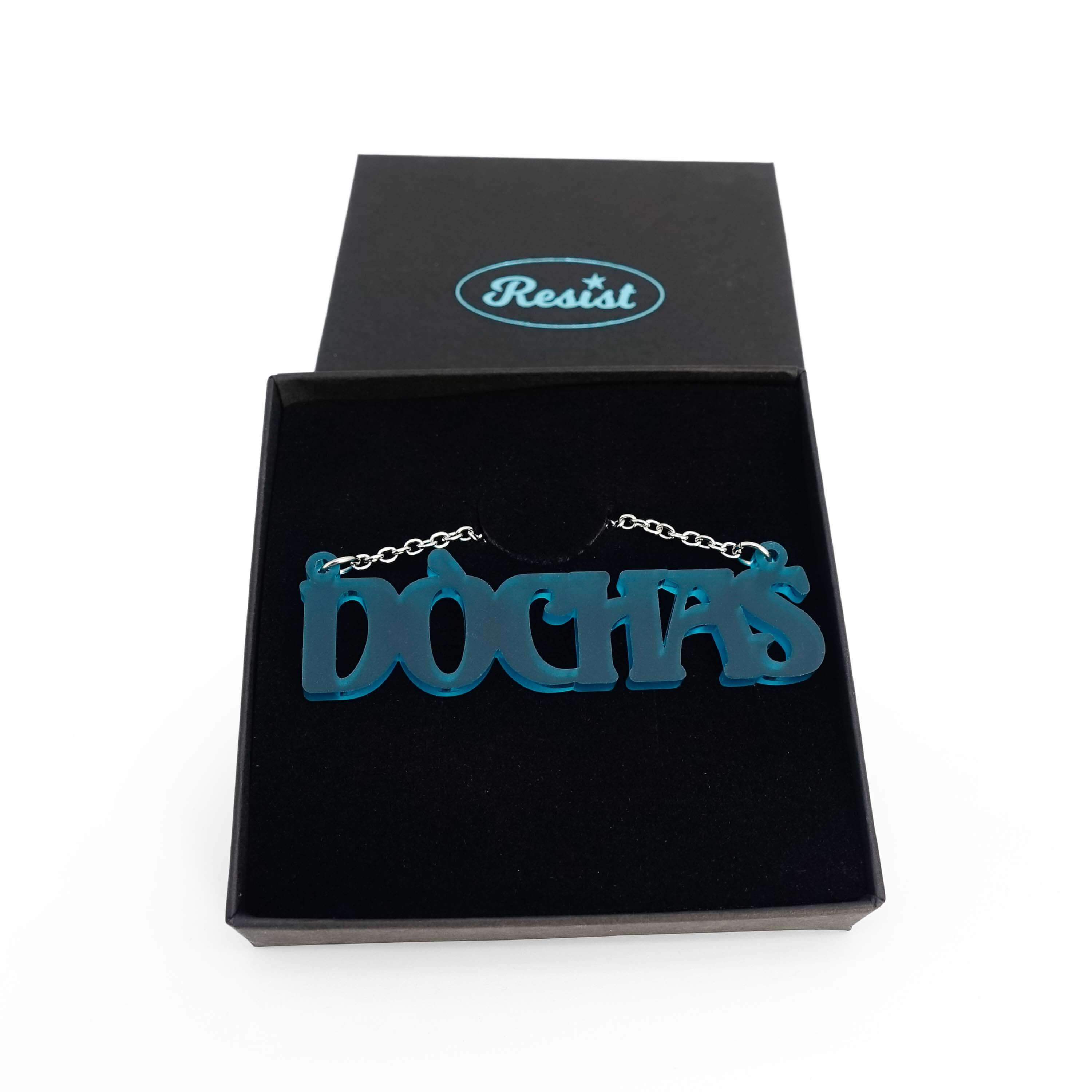 DÒCHAS Irish Gaelige hope necklace in teal frost, shown in a Wear & Resist gift box.