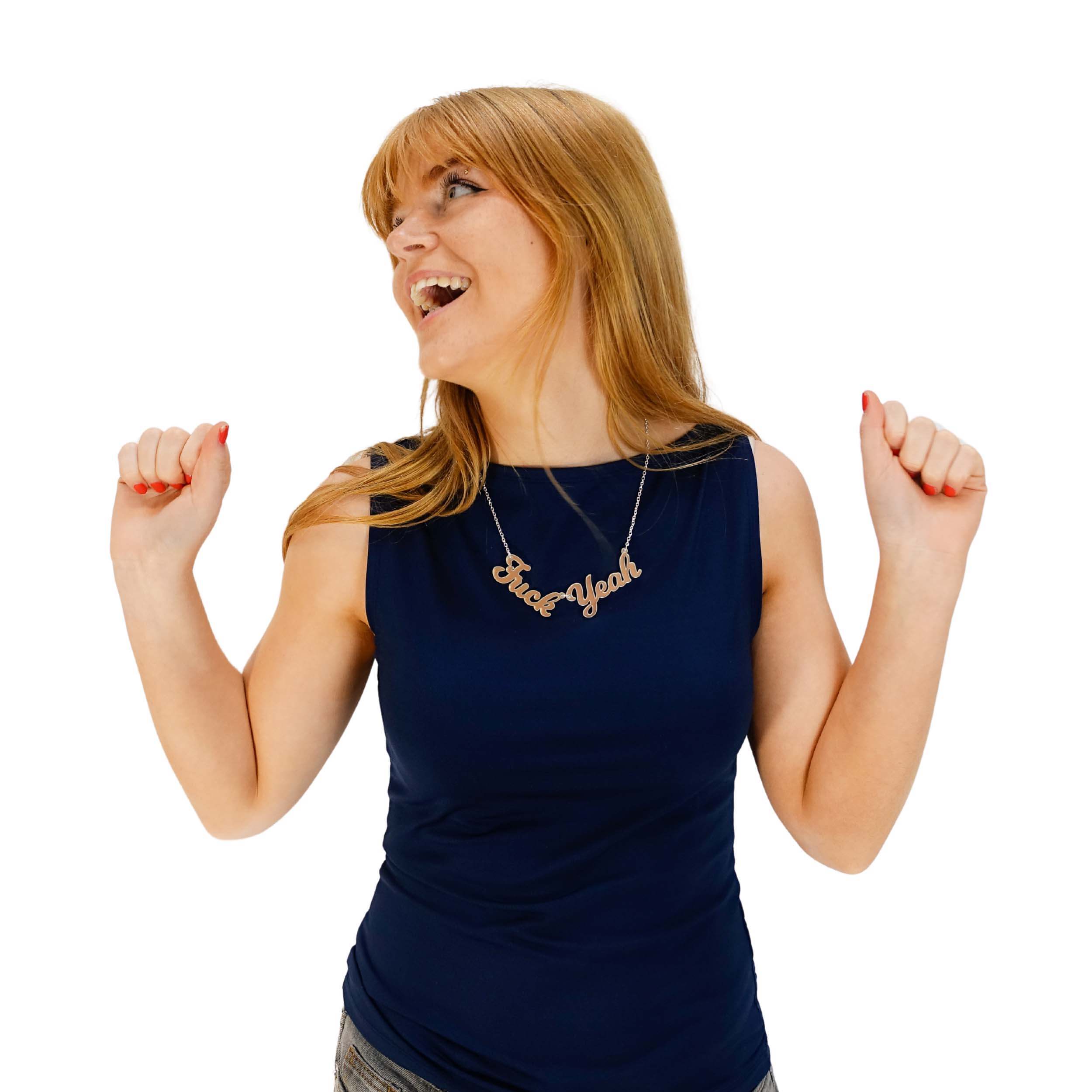 Eliza celebrates life wearing a F*ck Yeah necklace in matte iridescent.