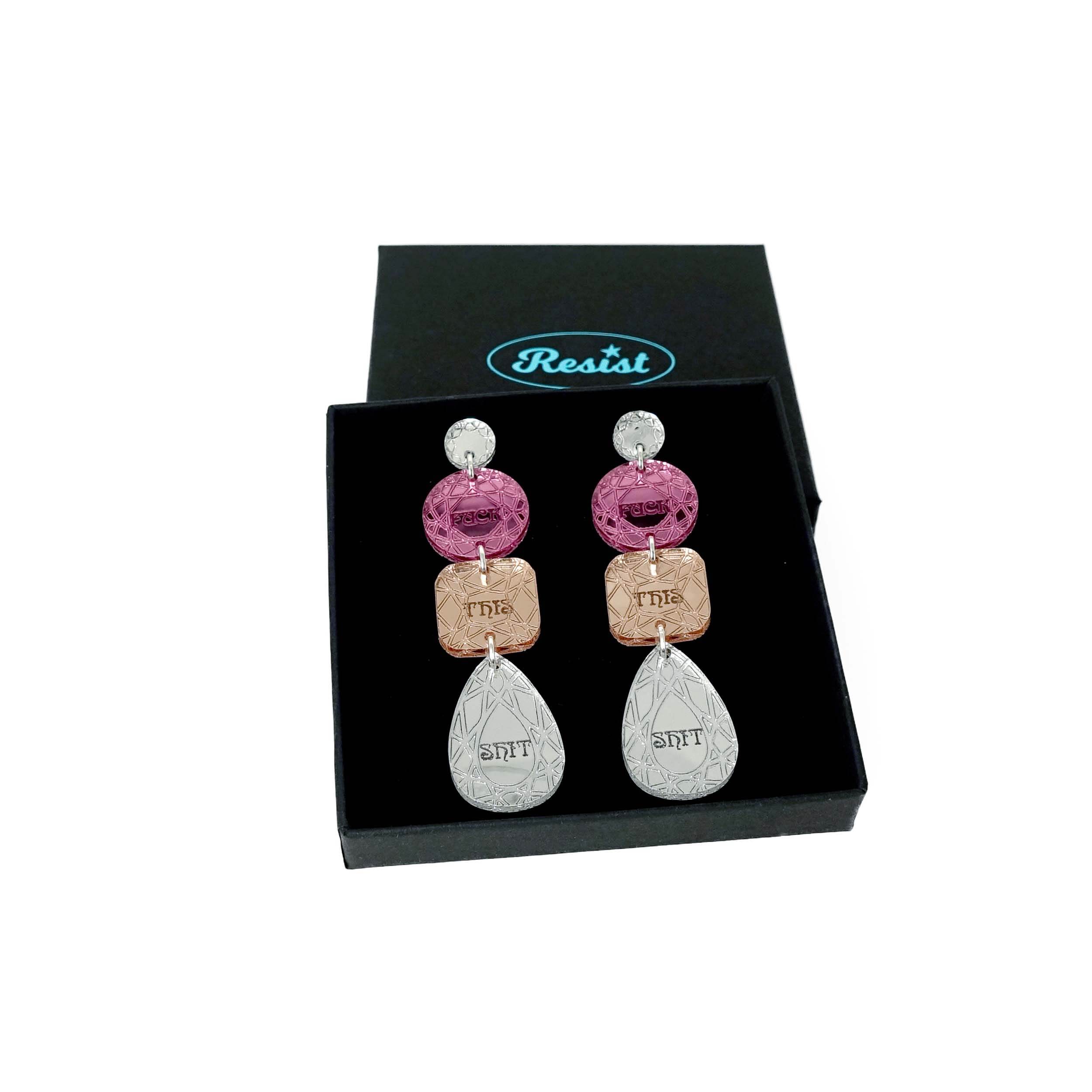 F*ck This Shit Sweary Jewel Drop Earrings in pink and rose gold shown in a Wear and Resist gift box.