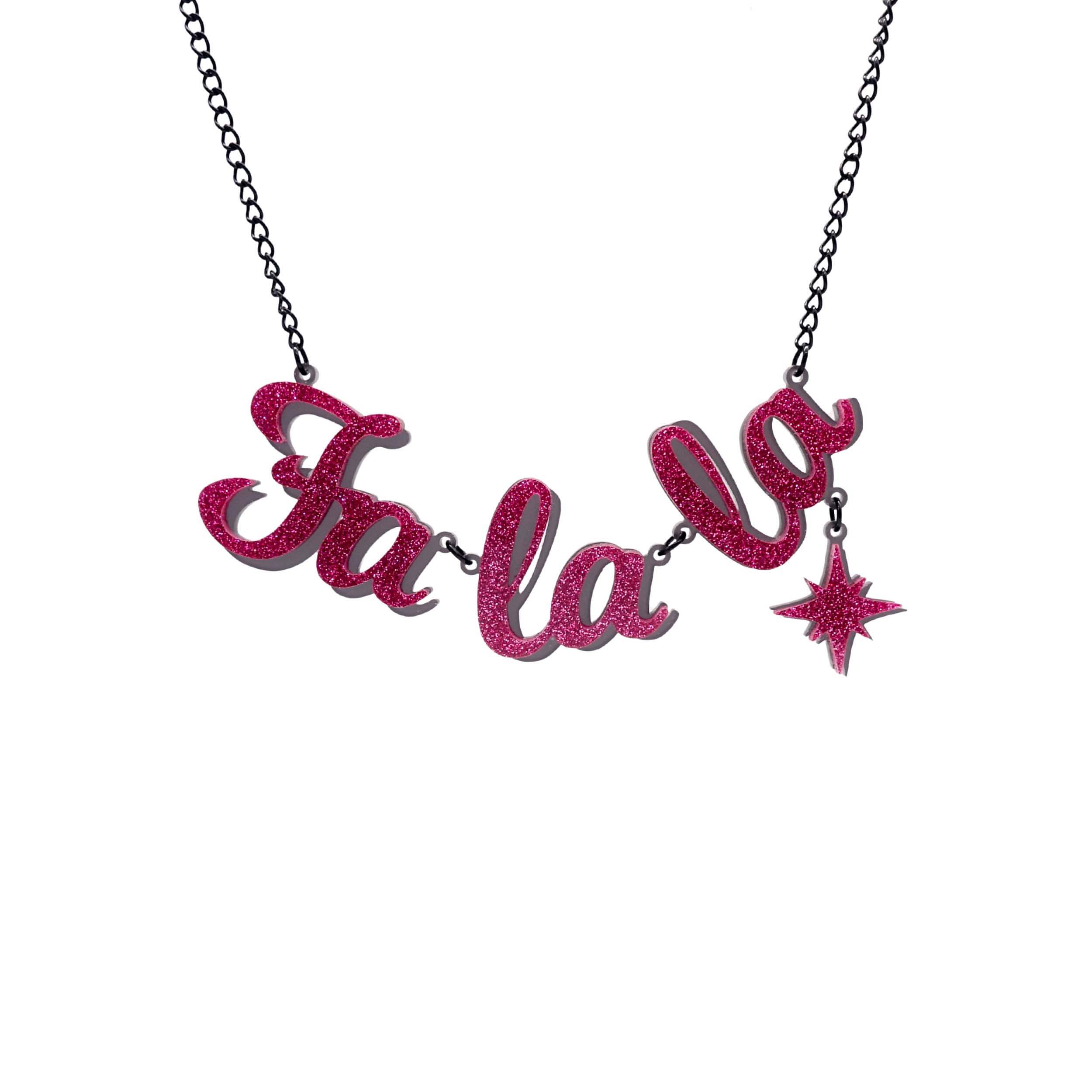 Fa La LA necklace in hot pink glitter, with hanging vintage star, shown hanging against a white background.