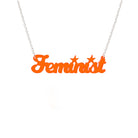 Script font Feminist necklace in fluoro orange, shown against a white background.