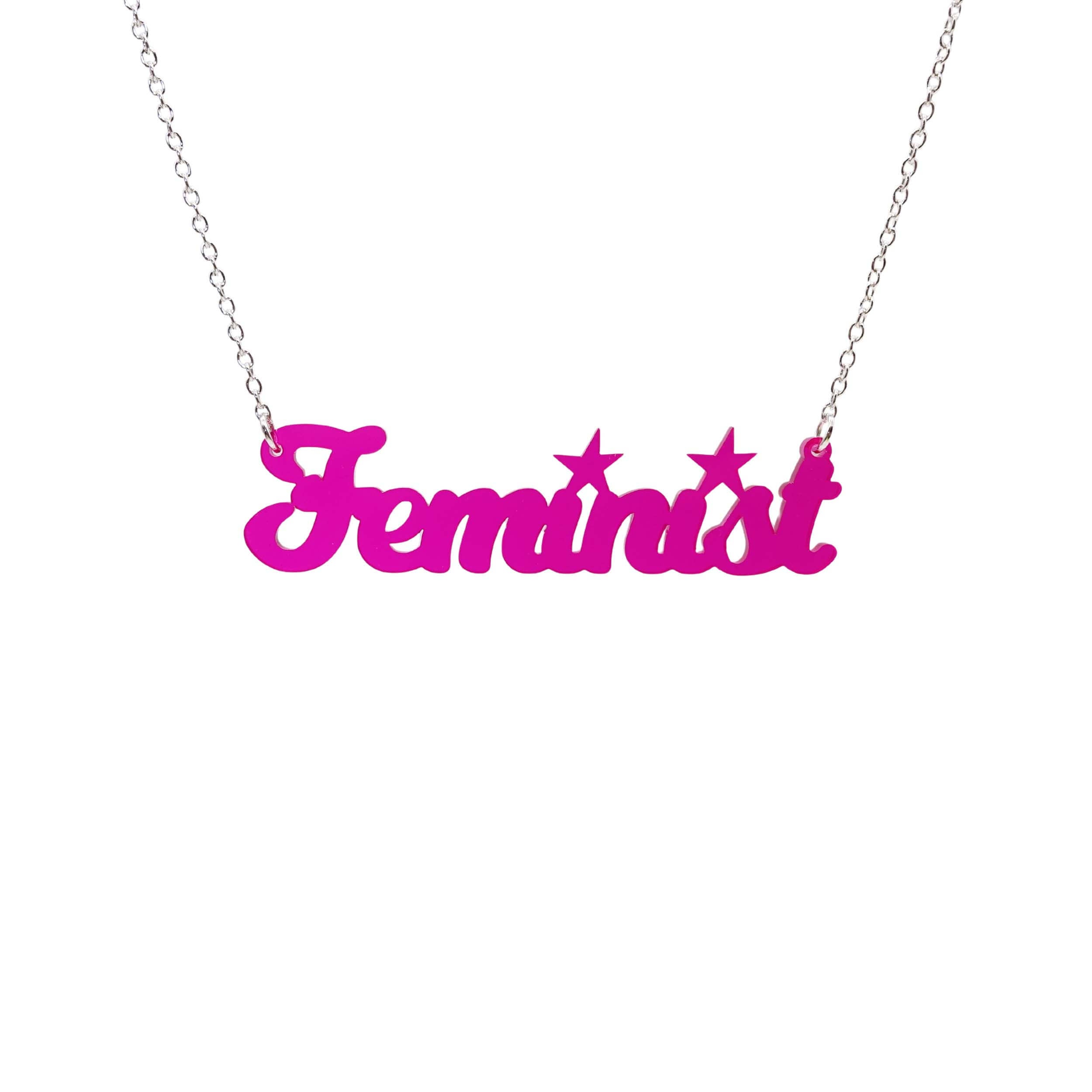 Script font Feminist necklace in neon pink.