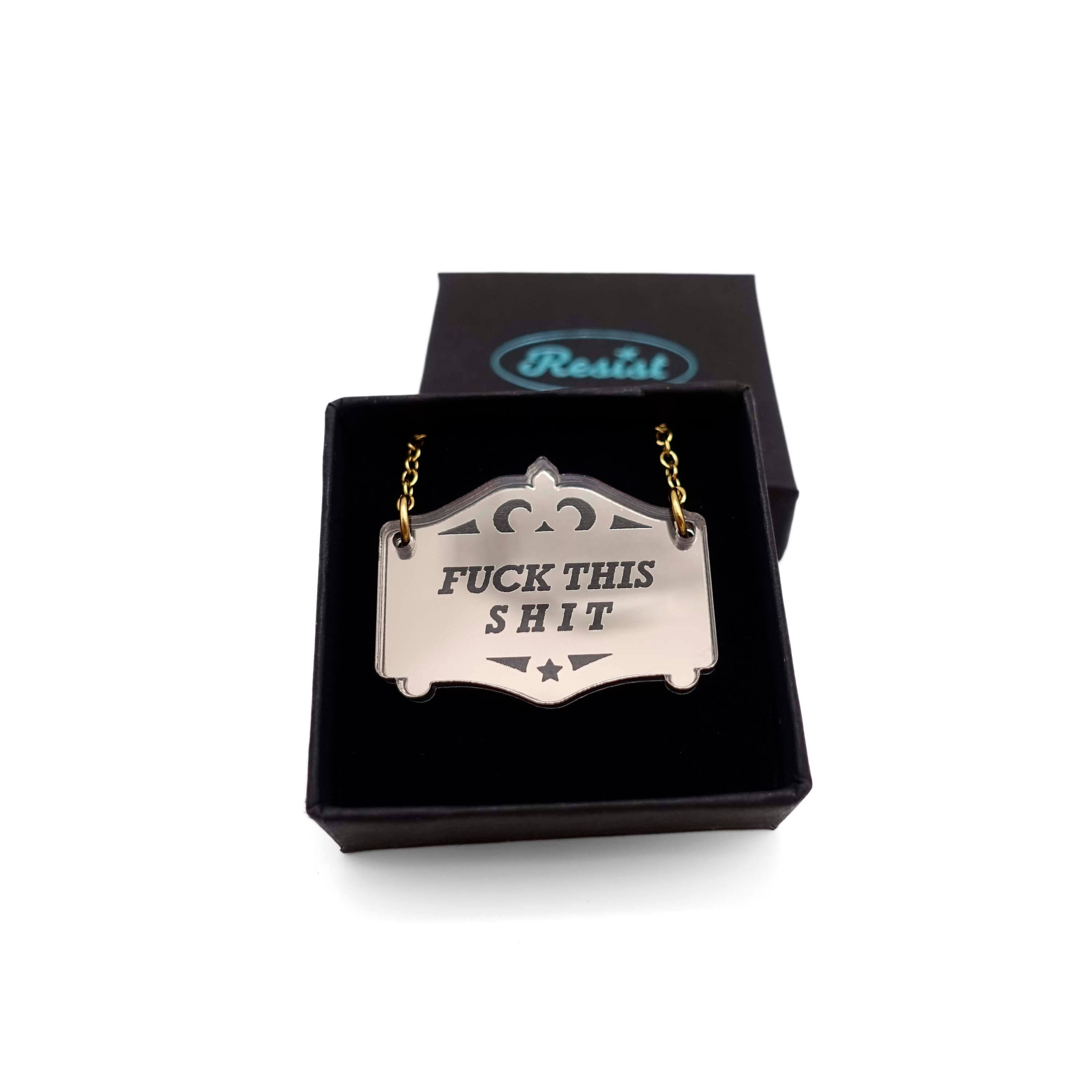 F*ck this sh*t mirror cowboy necklace in bronze, shown in a small Wear and Resist gift box.