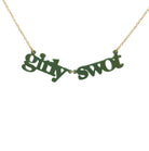 Girly Swot necklace in juniper green shown hanging against a white background.