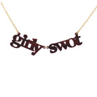 Girly Swot necklace in rich brown shown hanging against a white background.