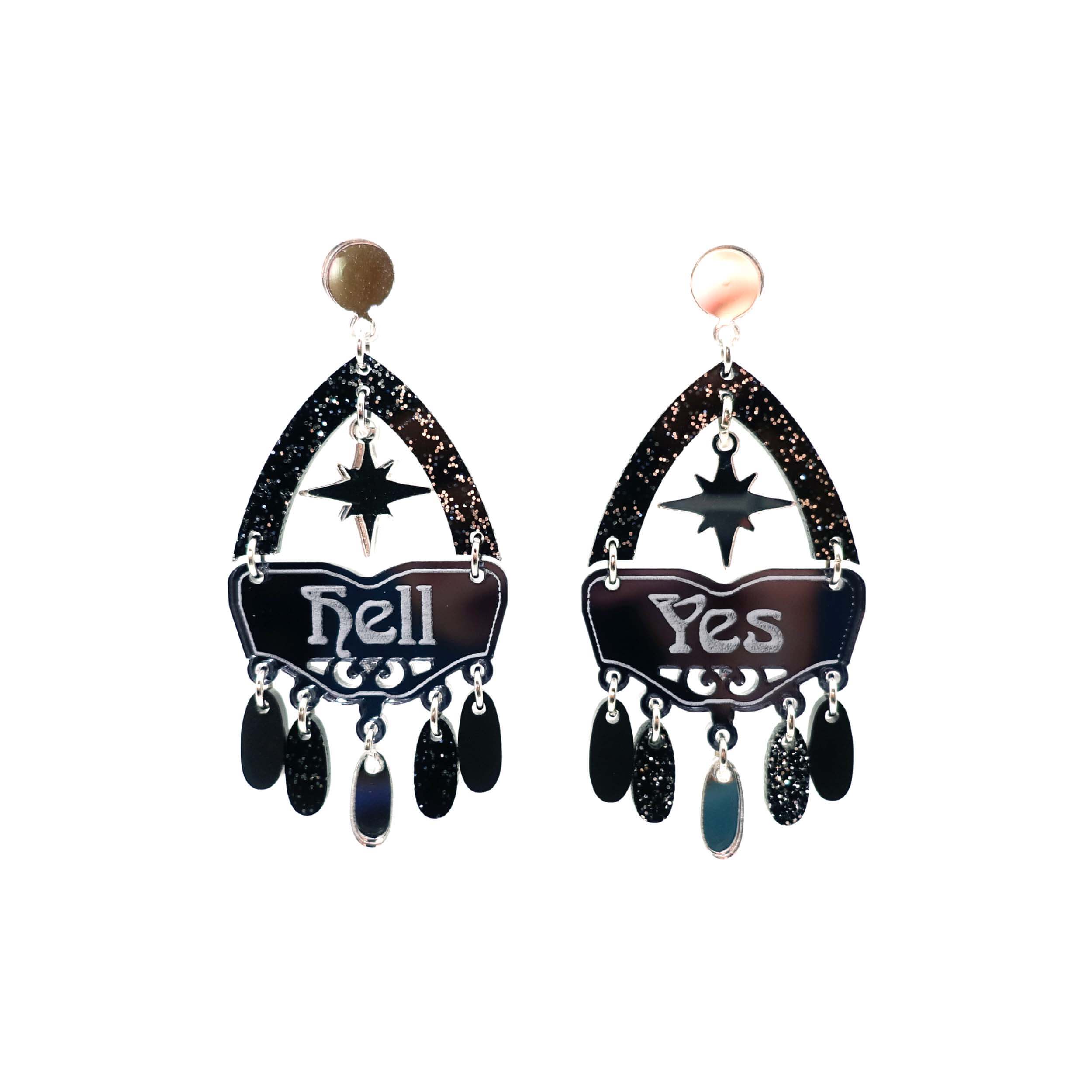 Western style Hell Yes statement earrings in black and silver. Shown cut out against a white background.