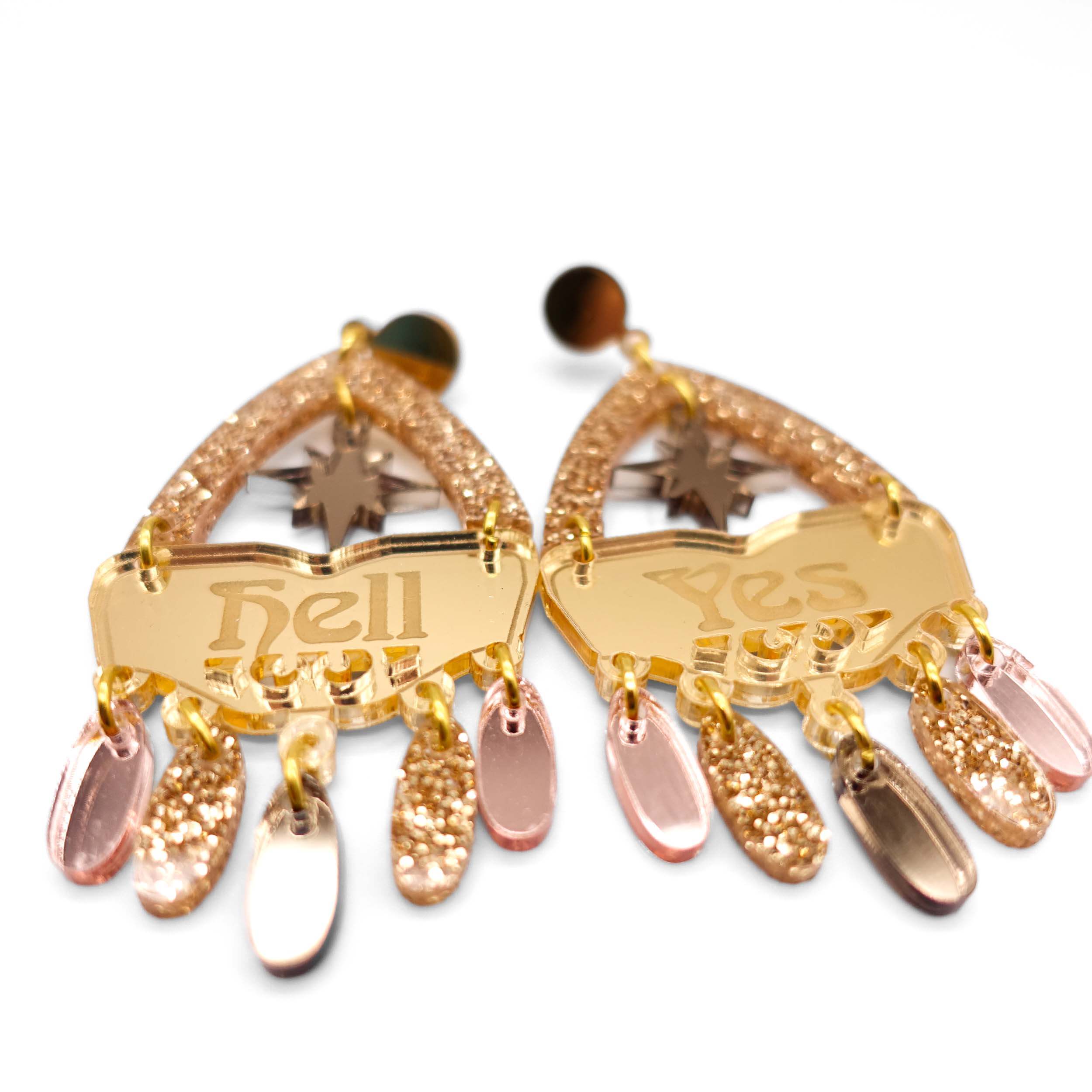 Western style Hell Yes statement earrings in gold and bronze. Designed by Sarah Day for Wear and Resist.