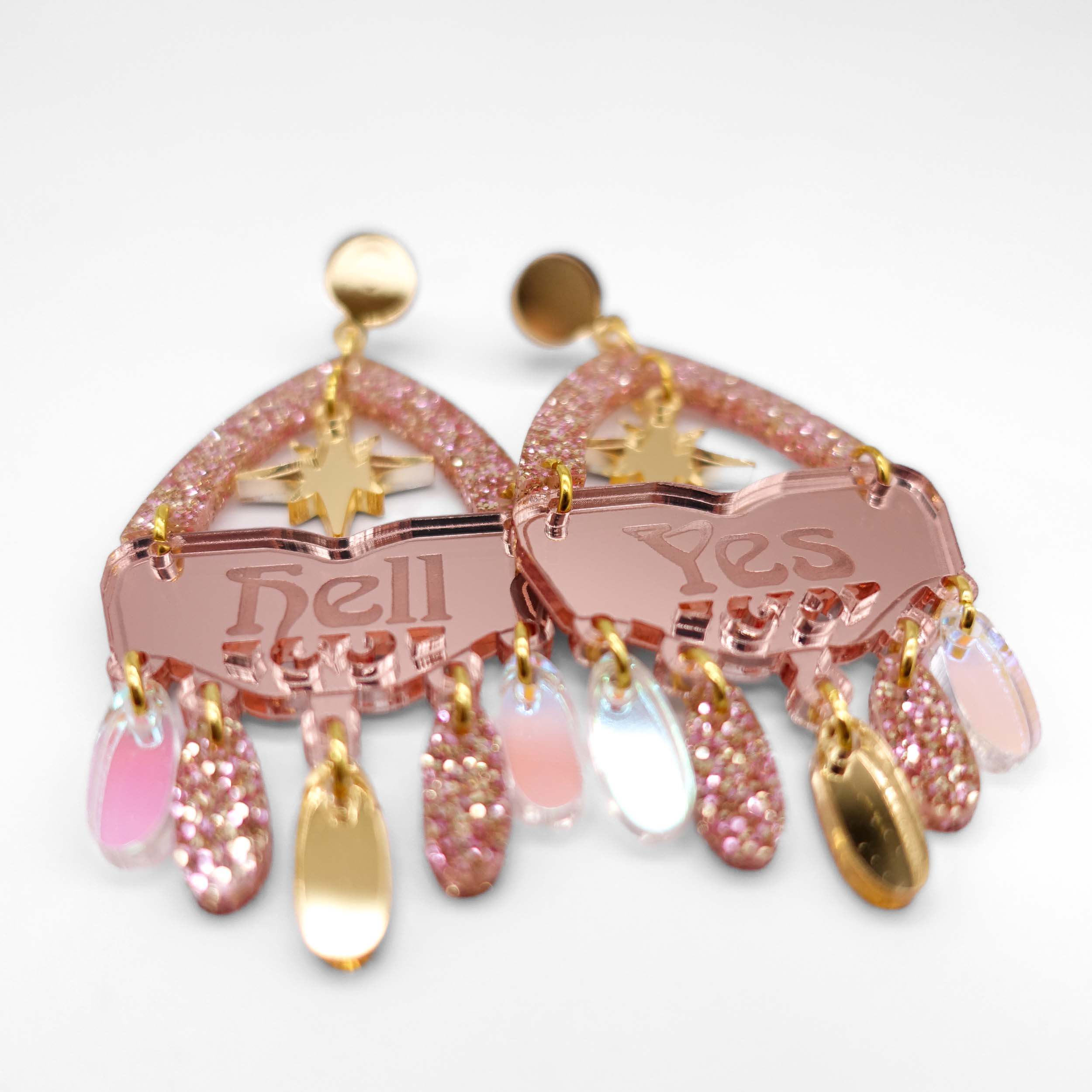 Western style Hell Yes statement earrings in rose gold. Designed by Sarah Day for Wear and Resist.