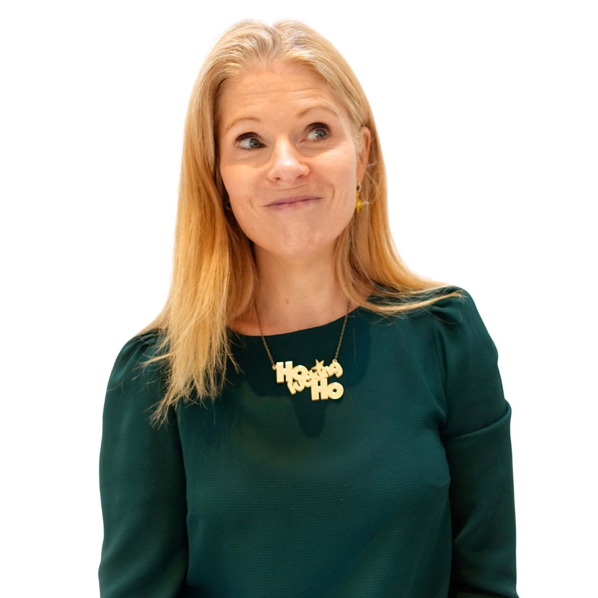 Sarah Day, founder of Wear and Resist, wears a Ho F*cking Ho necklace in gold mirror.