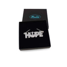 Hope necklace with Rebel Alliance symbol in silver glitter, shown in a Wear and Resist gift box.