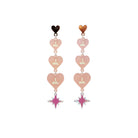 Blush pink  I am I am I am heart drop earrings finished with an iridescent star. The pigment glows in the dark.