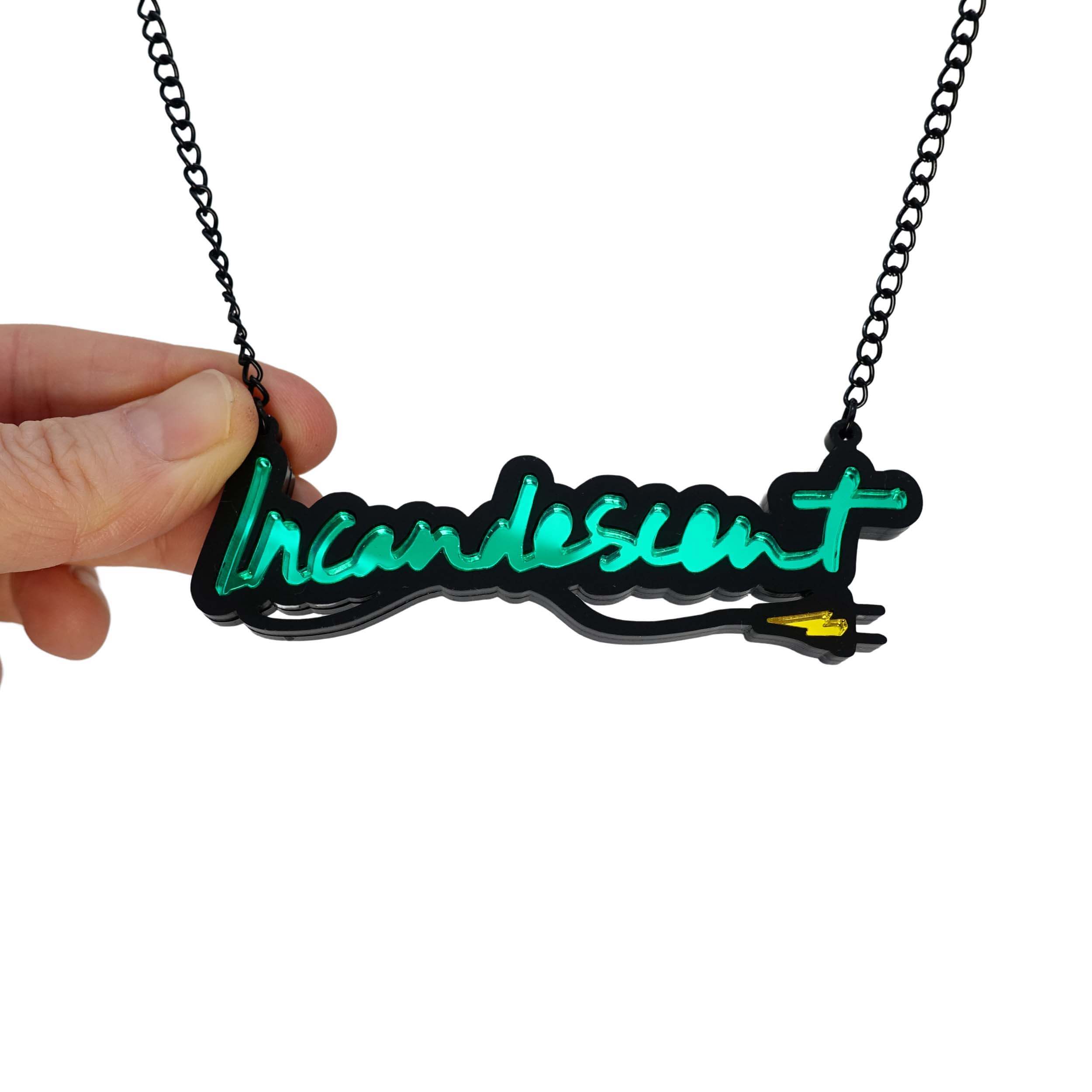 Incandescent neon necklace in electric green, designed by Sarah Day for Wear and Resist as an expression of rage and tribute to Tracey Emin's neon works, all in one.