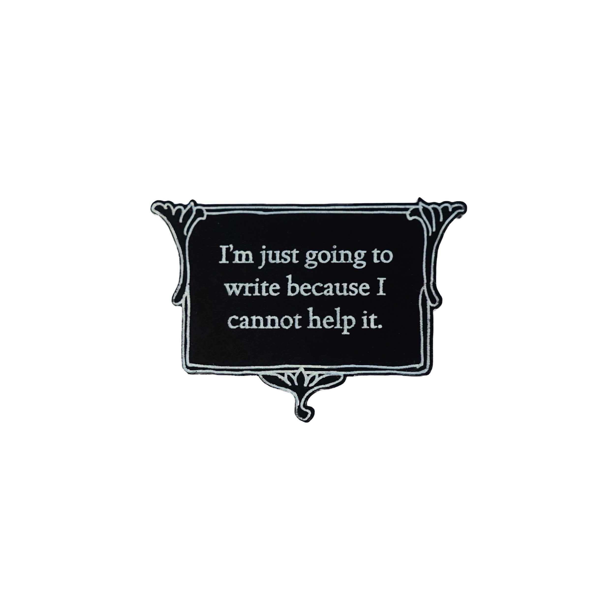 A vintage style black and white brooch etched in glow-in-the-dark pigment with Charlotte Bronte's words: 'I'm just going to write because I cannot help it.'