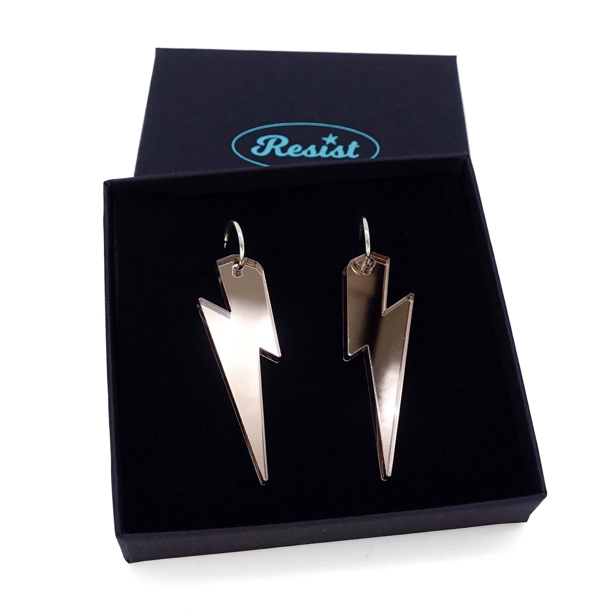 Large Lightning Bolt hoop earrings in bronze mirror, shown in a Wear and Resist gift box.