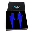 Massive Lightning Bolt hoop earrings in electric blue mirror, shown in a Wear and Resist gift box.
