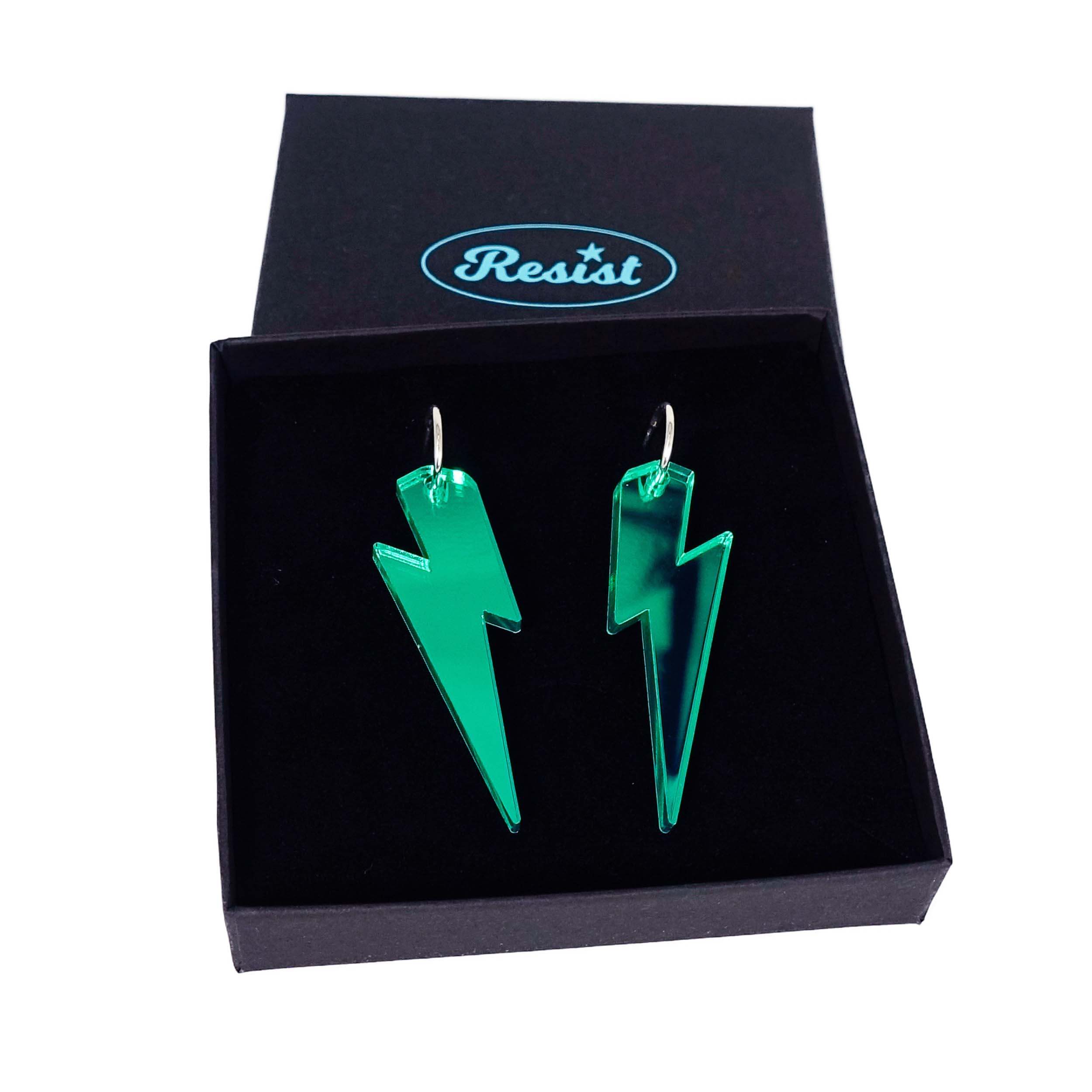 Large Lightning Bolt hoop earrings in electric green mirror, shown in a Wear and Resist gift box.