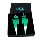 Massive Lightning Bolt hoop earrings in electric green mirror, shown in a Wear and Resist gift box.
