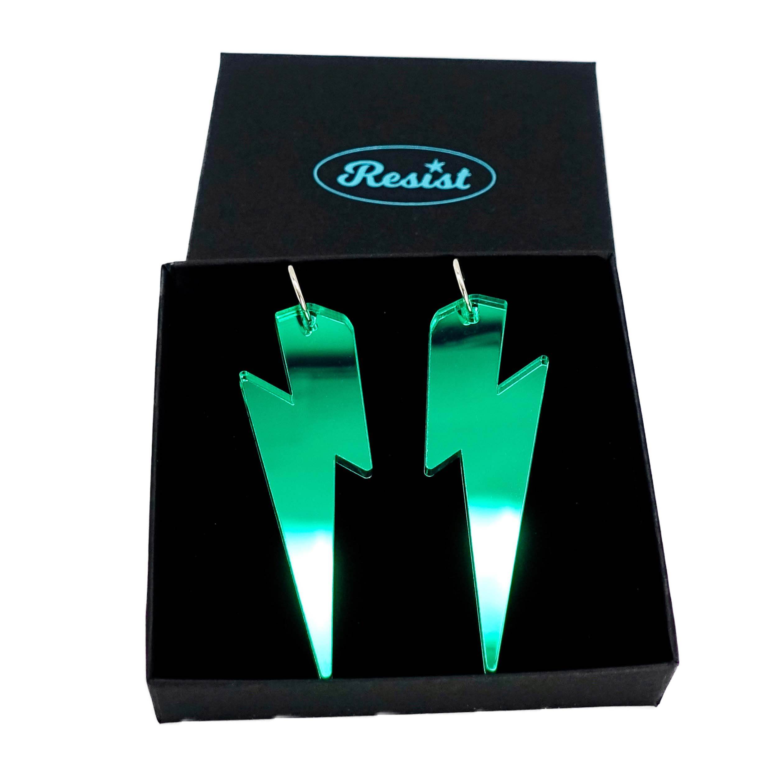 Massive Lightning Bolt hoop earrings in electric green mirror, shown in a Wear and Resist gift box.