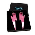 Massive Lightning Bolt hoop earrings in pink mirror, shown in a Wear and Resist gift box.