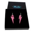 Pink mirror medium Lightning Bolt earrings on silver hoops, shown in a Wear and Resist gift box.