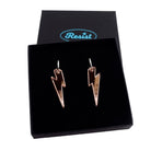 Rose gold mirror medium Lightning Bolt earrings on silver hoops, shown in a Wear and Resist gift box.