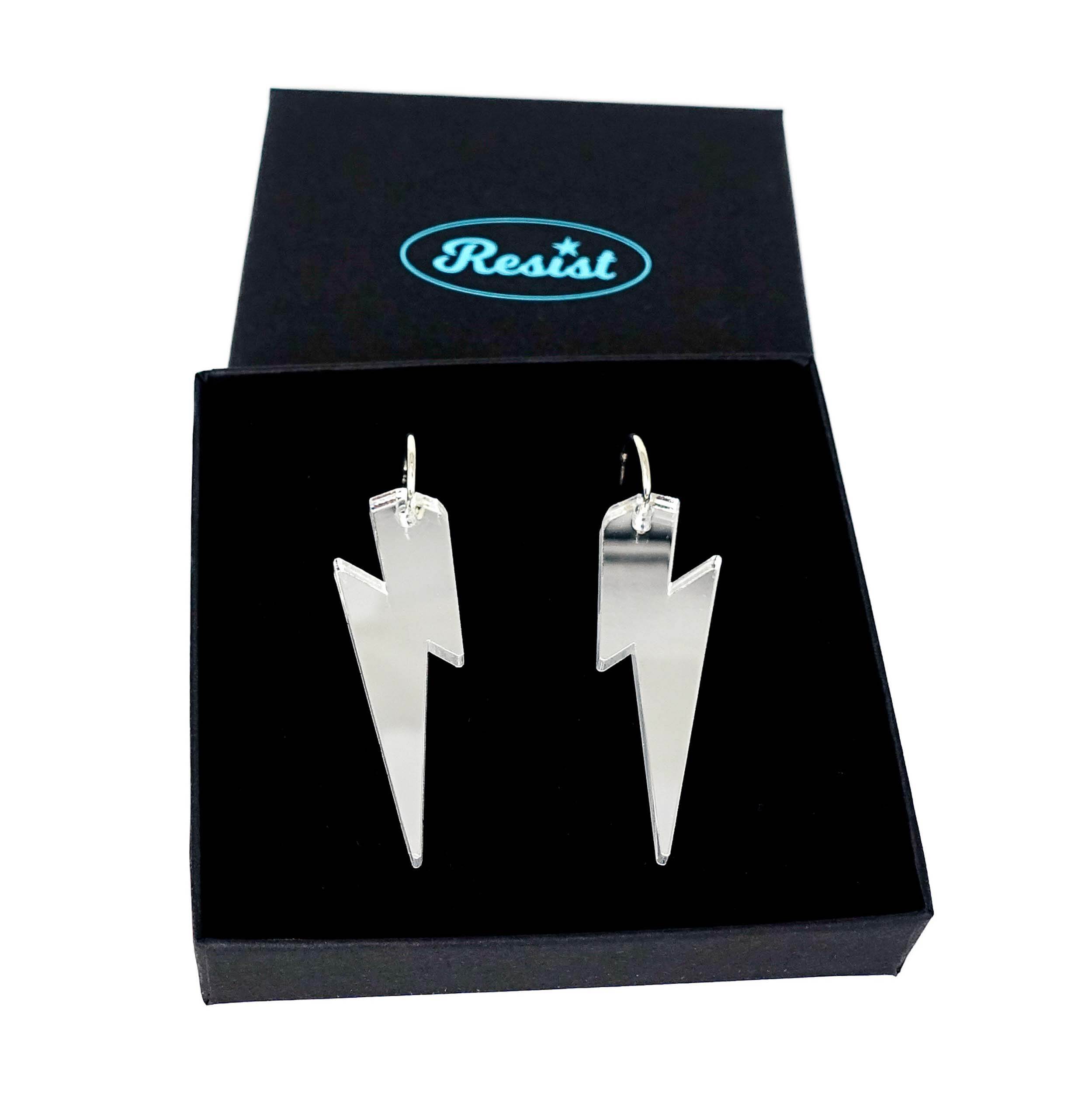 Large Lightning Bolt hoop earrings in silver mirror, shown in a Wear and Resist gift box.