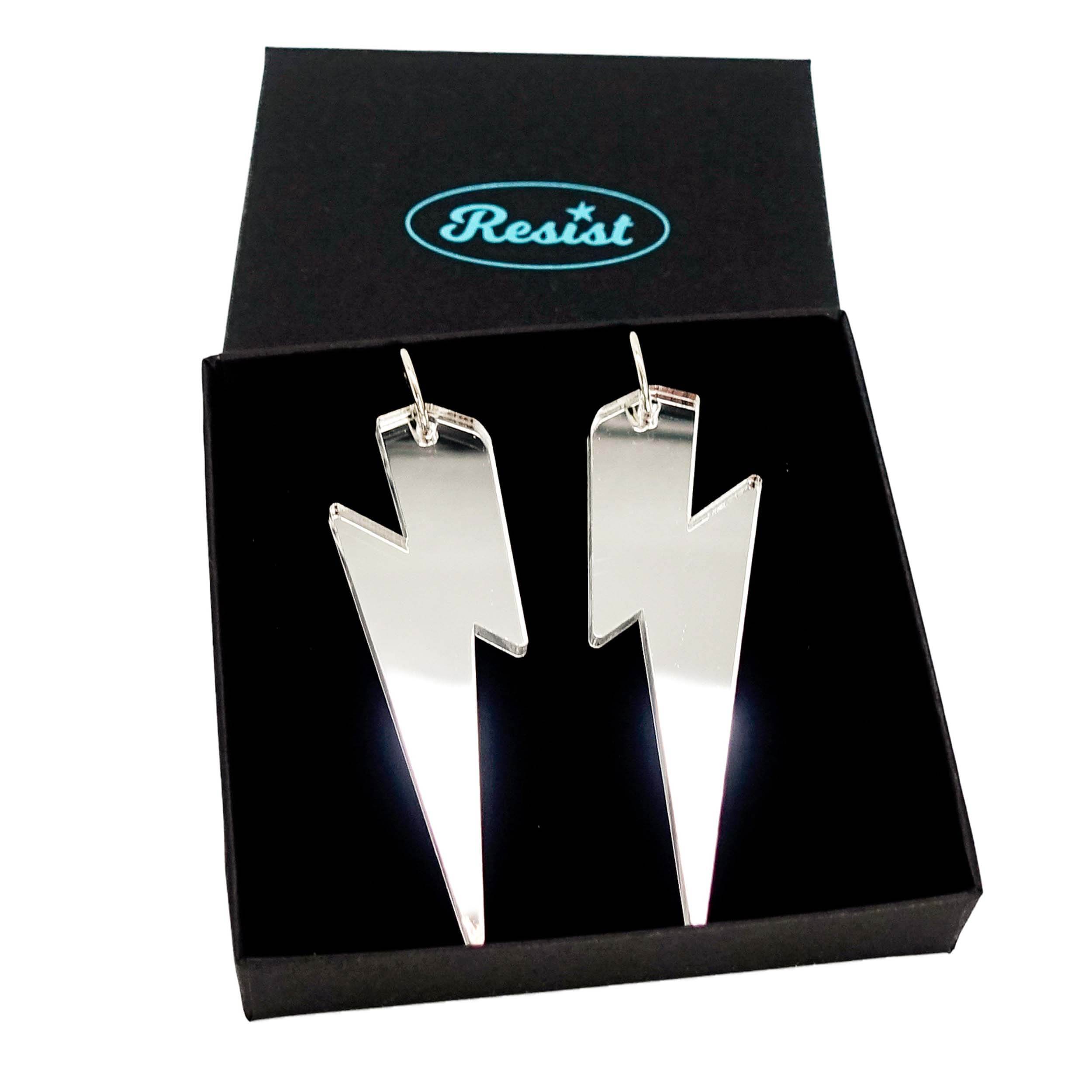 Massive Lightning Bolt hoop earrings in silver mirror, shown in a Wear and Resist gift box.