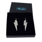 Silver mirror medium Lightning Bolt earrings on silver hoops, shown in a Wear and Resist gift box.