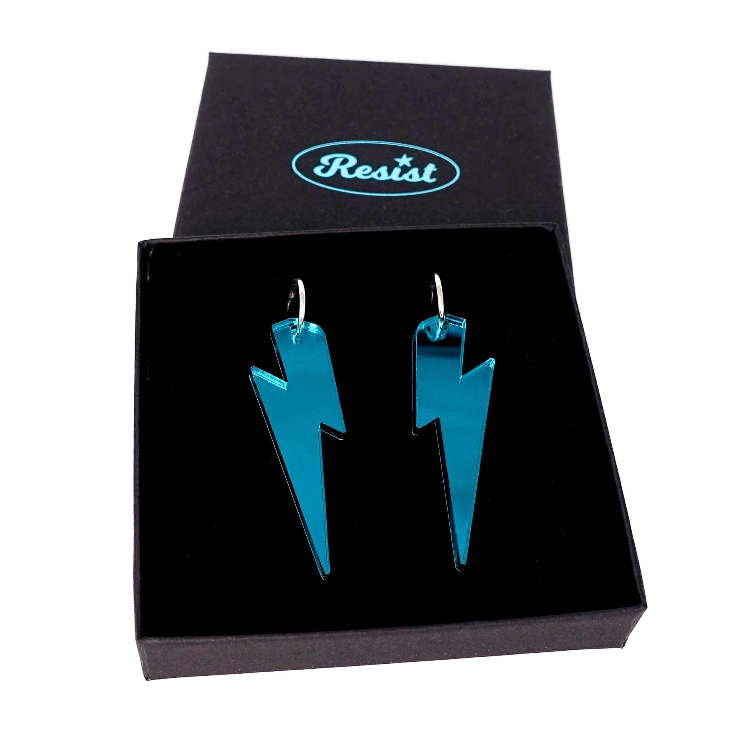 Large Lightning Bolt hoop earrings in teal mirror, shown in a Wear and Resist gift box.
