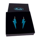 Teal mirror medium Lightning Bolt earrings on silver hoops, shown in a Wear and Resist gift box.