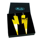 Massive Lightning Bolt hoop earrings in yellow mirror, shown in a Wear and Resist gift box.