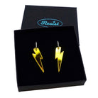 Yellow mirror medium Lightning Bolt earrings on silver hoops, shown in a Wear and Resist gift box.