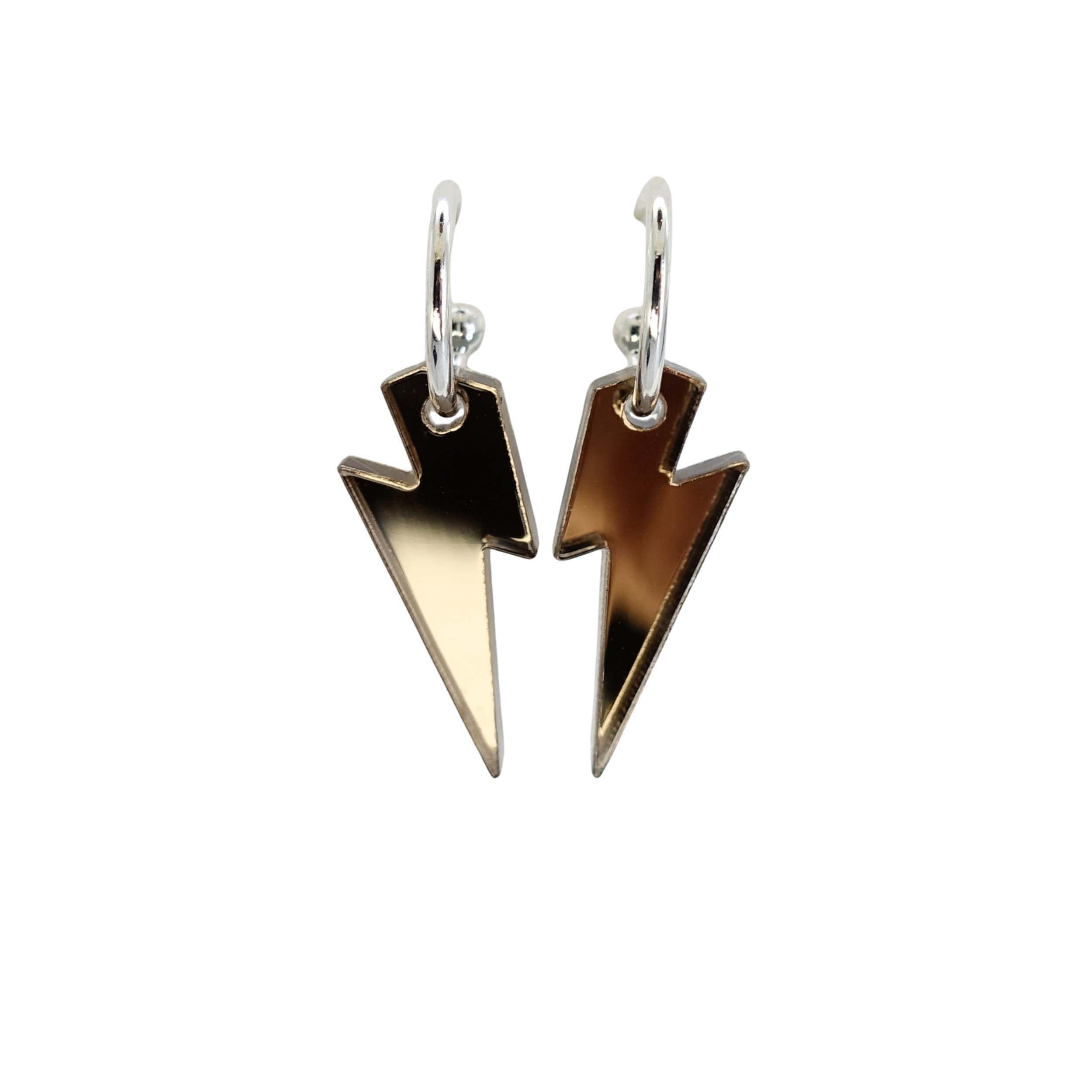 Small bronze mirror lightning bolt hoop earrings on silver plated hoops shown against a white background.