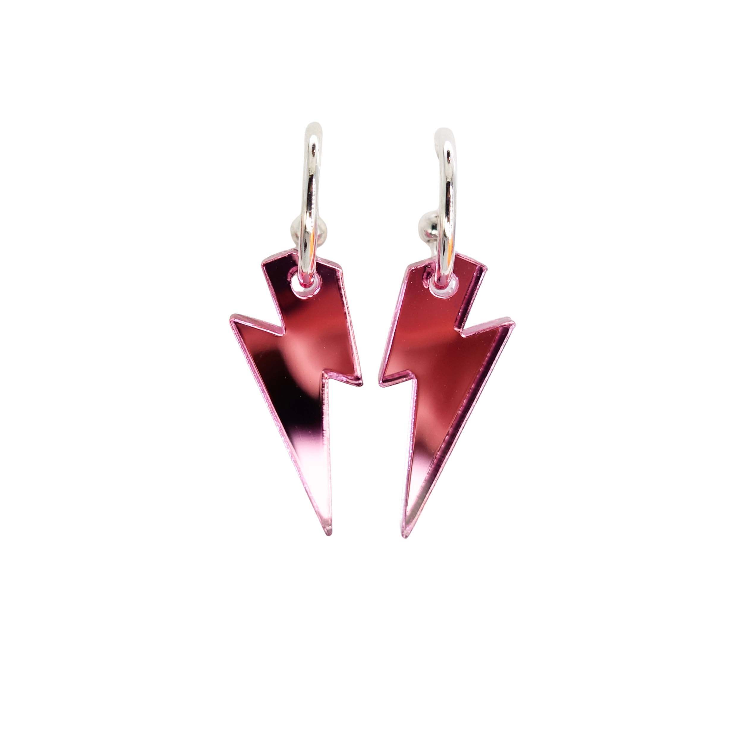 Small pink mirror lightning bolt hoop earrings on silver plated hoops shown against a white background.