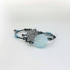 May I Be Safe bracelets in sea foam and shale shown against a white background.